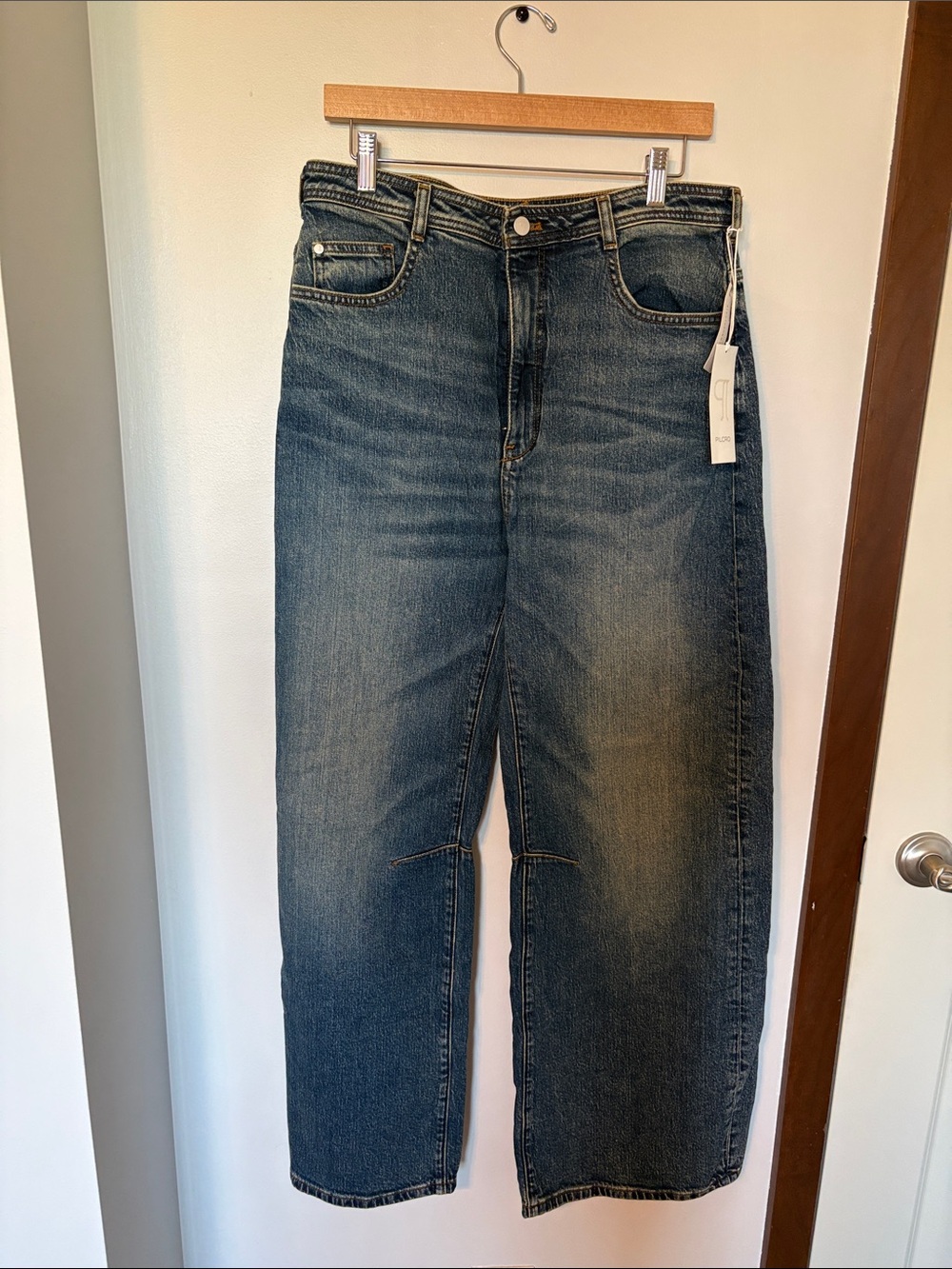 Pilcro Wide-Leg Flare Jeans in Washed Blue